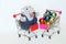 Carts from the supermarket with the symbol of the 2020 year - a mouse and Christmas tree decorations. Seasonal sales. New Year and