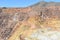 Of carved away portions of rock from a large mine near Bisbee, Arizona