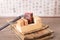 A carved bed with a stone seal and a carving knife on the old book