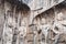 Carved Buddhist statues in the main Longmen Grotto