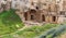 Carved chambers and steps cut into rock in the tomb of the kings area of paphos cyprus