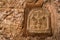 Carved cross embedded in wall of Church of Holy Sepulcher