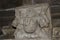 Carved Dwarf holding pillar on the inner wall of Kukdeshwar Temple, dedicated to Lord Shiva, it lies on the banks of Kukdi river,