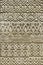 Carved embossed patterns on the stone wall of an ancient church building as a background. Fragment, detail.