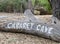 Carved entrance Cabaret Cave sign in Yanchep National Park