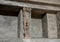 Carved figure and niche where bath supplies stored in bathhouse remains, Scavi Di Pompei