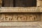 Carved figures on the plinth of the inner courtyard, cloisters or pillared verandah. Achyuta Raya temple, Hampi, Karnataka. Sacred