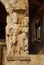 Carved figures on the sober and square pillars of the entrance porch of Durga temple, Aihole, Bagalkot, Karnataka. The Galaganatha