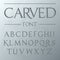 Carved font, engraved on the wall modern realistic letters in roman style, serif