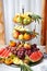 Carved fruits arrangement. Fresh various fruits. Assortment of exotic fruits.
