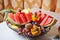 Carved fruits arrangement. Fresh various fruits. Assortment of exotic fruits.