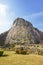 Carved golden buddha image on the cliff at Khao Chee Jan, Pattaya, Thailand