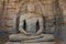 Carved granite statue of seated Buddha at Polonnaruwa