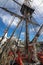 Carved head of sailor, rigging ropes at foredeck of Tall Ship HM