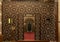 Carved Islamic tiled wall with door inside the Cavern Church known as Abu Serga in Coptic Christian Cairo, Egypt.