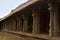 Carved pillars of the inner courtyard, cloisters or pillared verandah, Achyuta Raya temple, Hampi, Karnataka. Sacred Center.