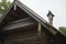 Carved pipe of wood, sloping roof on the old house, built in 1495, wooden architecture