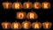 Carved Pumpkin Letters with candle the trick or treat