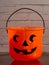 Carved pumpkin shaped candy basket