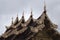 Carved rooftop detail at Wat Saen Muang Ma Luang