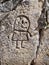 Carved stone with girl symbol at Galicia Spain