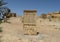 Carved stone information plaque for Gebel Al Mawta, the `Mountain of the Dead`, in Siwa Oasis, Egypt.