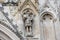 Carved stone knight on a cathedral wall