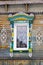 Carved window in old russian wooden country house