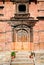 Carved wooden door on Hanuman Dhoka, old Royal Palace in Kathmandu, Nepal.