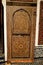 Carved wooden door in Marrakech museum interior