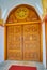 The carved wooden door of the temple of Sitagu International Buddhist Academy