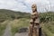 Carved wooden Maori statue at Te Ahua Point lookout