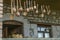 Carved wooden souvenirs, spoons and toys on the veranda with brick columns on Sharambeyan street in Tufenkian Museum Old Dilijan