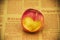 Carving heart-shaped pattern in apple