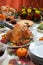 Carving Roasted Turkey on Harvest Table