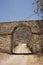 Casa Hacienda de Yaca from the abandoned and dilapidated sugar industry arc and door dirth road 20th century adobe