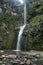 Cascada Taxopamba waterfall flowing into pool Otavalo Ecuador