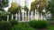 Cascade of Fountains and Tropical Greenery Near Modern Condominium Apartment