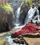 Cascade imlil - Marrakesh waterfall tourist destination with welcome writting mountain range in Morocco Africa during spring