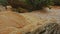 Cascade of Stormy Mountain Brown Water River among Stones