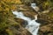 Cascade of Swiftwater Falls over granite rocks, Franconia, New H