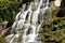 Cascade waterfall in the dendrological park in Uman
