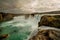 Cascades of waterfalls dropping down from the cliffs. Long exposure. tslandtya.