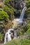 Cascading Saar Waterfalls slashes through Saar river gorge. Spring time in the Golan Heights