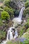 Cascading Saar Waterfalls slashes through Saar river gorge. Spring time in the Golan Heights