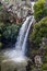 Cascading Saar Waterfalls slashes through Saar river gorge. Spring time in the Golan Heights