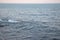 Cascading sea water over a rocky out crop on an outgoing tide