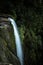 Cascading waters flow off tall cliffs