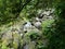 Cascata da Grena waterfall of the Parque da Grena natural park on the island of Sao Miguel in Azores