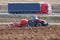 Case IH magnum tractor working beside highway in Germany